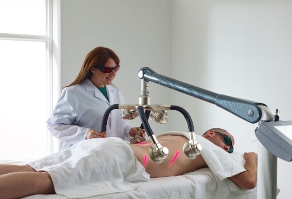 Chiropractic Irvine CA Patient Receiving Laser Therapy